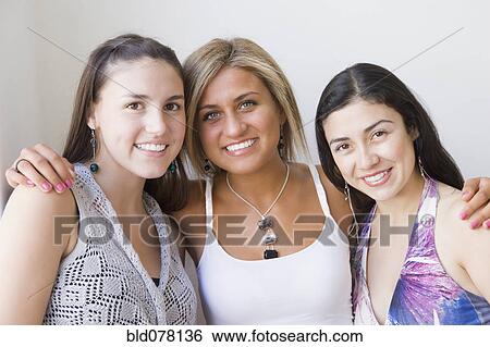 Hispanic women smiling View Large Photo Image Stock Photograph - Hispanic women smiling. Fotosearch