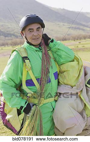 Senior Hispanic man skydiving View Large Photo Image Stock Image - Senior Hispanic man skydiving. Fotosearch