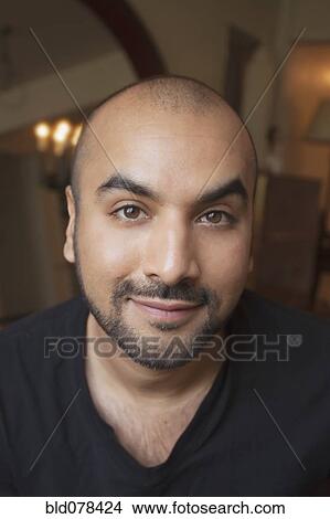 Picture - Close up of smiling mixed race man. Fotosearch