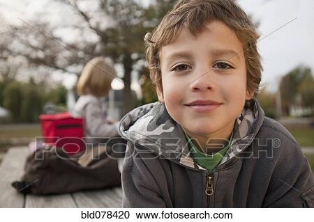 Mixed race boy smiling outdoors View Large Photo Image Stock Image - Mixed race boy smiling outdoors. Fotosearch
