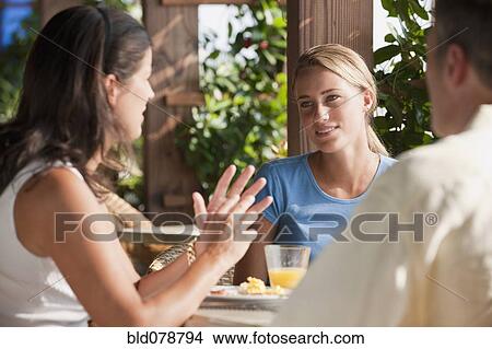 Caucasian family eating in restaurant View Large Photo Image Picture - Caucasian family eating in restaurant. Fotosearch