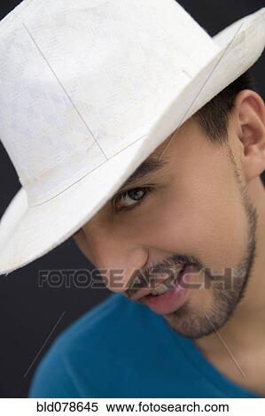 Hispanic man in white fedora hat View Large Photo Image Stock Photography - Hispanic man in white fedora hat. Fotosearch