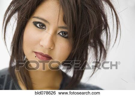 Hispanic teenage girl with wild hairstyle View Large Photo Image Stock Photograph - Hispanic teenage girl with wild hairstyle. Fotosearch