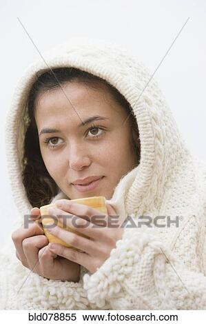 Hispanic woman drinking coffee View Large Photo Image Stock Photography - Hispanic woman drinking coffee. Fotosearch