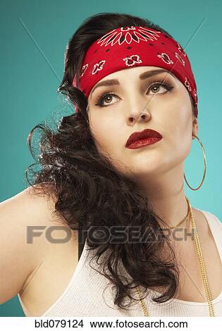 Stock Photo of Glamorous Hispanic woman wearing bandana bld079124