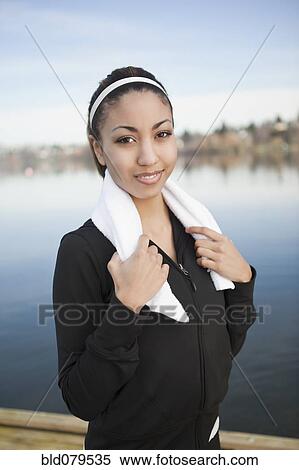 Mixed race woman with towel around neck View Large Photo Image Stock Photography - Mixed race woman with towel around neck. Fotosearch