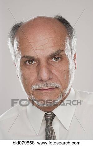 Serious Caucasian businessman View Large Photo Image Stock Photo - Serious Caucasian businessman. Fotosearch