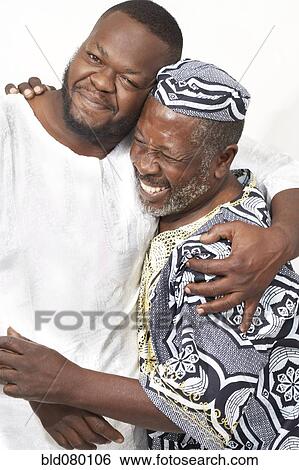 African American father and son hugging View Large Photo Image Stock Photograph - African American father and son hugging. Fotosearch