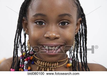 Stock Image - African American girl smiling. Fotosearch