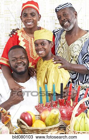 Stock Image - African American multi-generational family in traditional clothing. Fotosearch