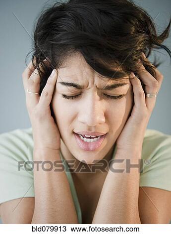 Hispanic woman with headache View Large Photo Image Stock Image - Hispanic woman with headache. Fotosearch