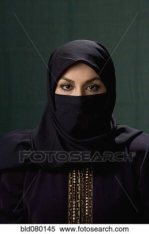 Middle Eastern woman wearing hijab View Large Photo Image Stock Photography - Middle Eastern woman wearing hijab. Fotosearch