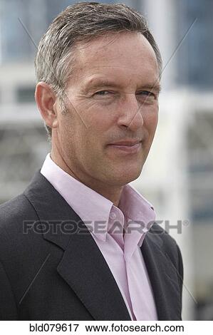 Serious Caucasian businessman View Large Photo Image Stock Photo - Serious Caucasian businessman. Fotosearch