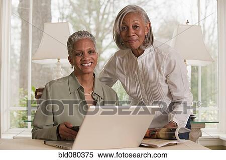 Black businesswoman working together View Large Photo Image Stock Photography - Black businesswoman working together. Fotosearch