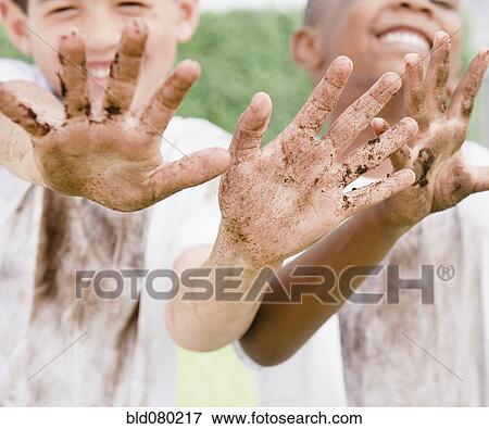 Boys displaying their messy hands View Large Photo Image Stock Photo - Boys displaying their messy hands. Fotosearch