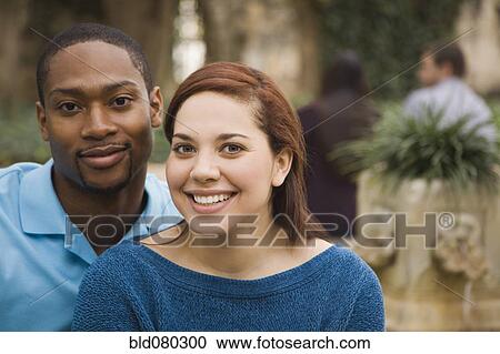 Stock Image - Couple smiling together. Fotosearch