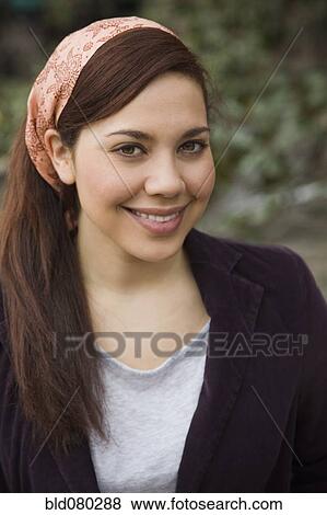 Stock Photo - Mixed race woman smiling. Fotosearch