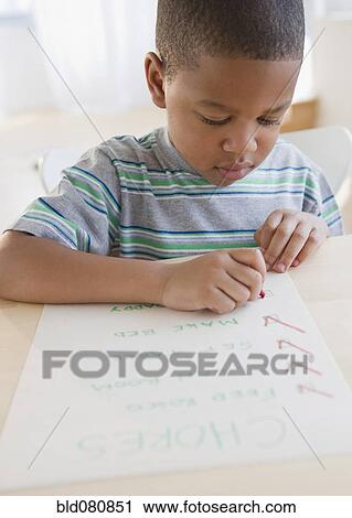 African American boy checking list of chores View Large Photo Image Stock Image - African American boy checking list of chores. Fotosearch
