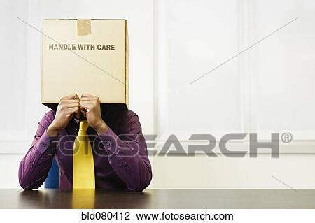 Black businessman with box over his head View Large Photo Image Stock Image - Black businessman with box over his head. Fotosearch