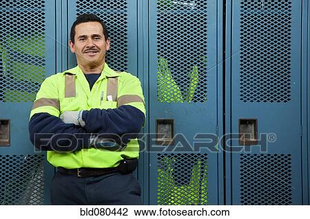 Hispanic sanitation worker in locker room View Large Photo Image Stock Image - Hispanic sanitation worker in locker room. Fotosearch