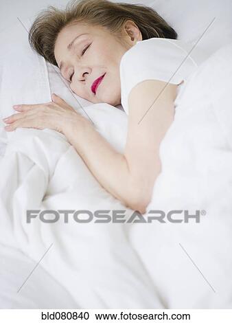 Japanese woman sleeping in bed View Large Photo Image Stock Image - Japanese woman sleeping in bed. Fotosearch
