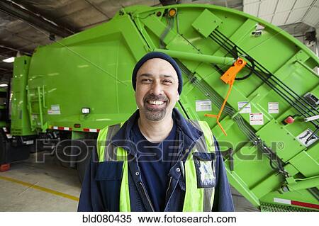Pacific Islander man standing by garbage truck View Large Photo Image Stock Photography - Pacific Islander man standing by garbage truck. Fotosearch