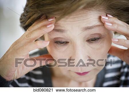 Sad Japanese woman with head in hands View Large Photo Image Stock Image - Sad Japanese woman with head in hands. Fotosearch