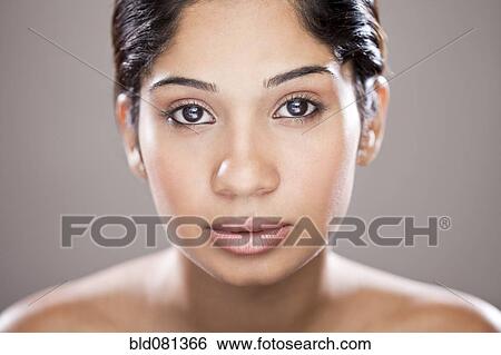 Stock Photograph - Serious Hispanic woman. Fotosearch