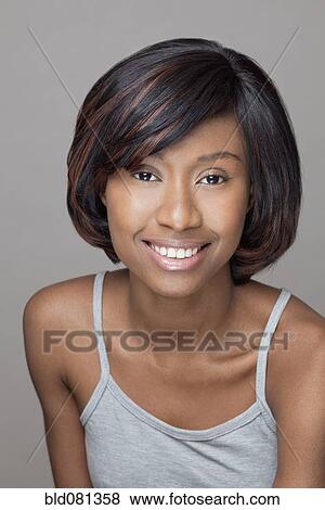 Stock Photo - Smiling Black woman. Fotosearch