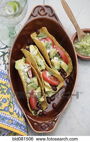 Black bean tacos and avocado View Large Photo Image Stock Photograph - Black bean tacos and avocado. Fotosearch