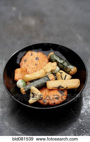 Close up of Japanese rice crackers in bowl View Large Photo Image Stock Photo - Close up of Japanese rice crackers in bowl. Fotosearch