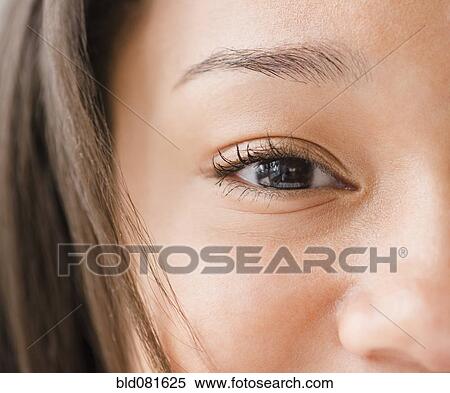 Close up of mixed race teenage girl's eye View Large Photo Image Stock Photography - Close up of mixed race teenage girl's eye. Fotosearch