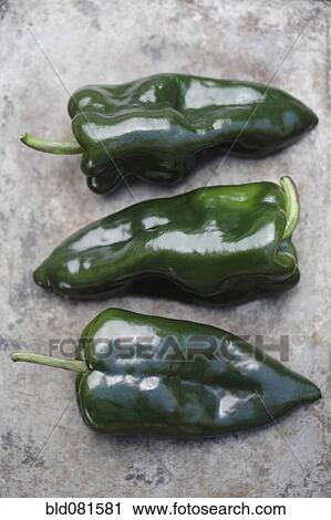 Stock Image - Close up of poblano chilies. Fotosearch