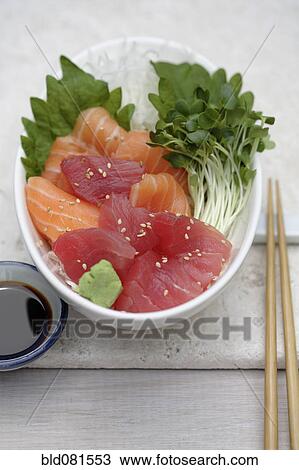 Stock Image - Close up of sashimi and sprouts. Fotosearch