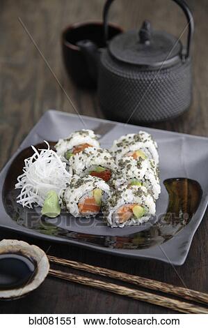 Stock Image - Sushi rolls and tea. Fotosearch