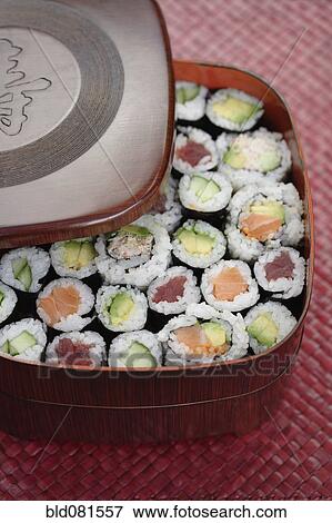 Stock Photo - Variety of sushi rolls in box. Fotosearch