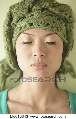 A young woman deep in thought View Large Photo Image Stock Image - A young woman deep in thought. Fotosearch
