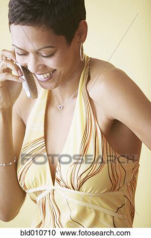 African American woman on cell phone smiling View Large Photo Image Stock Image - African American woman on cell phone smiling. Fotosearch