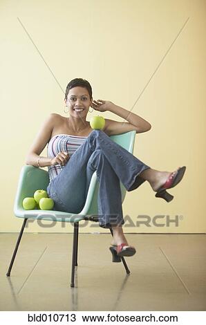 African American woman sitting with apples View Large Photo Image Stock Image - African American woman sitting with apples. Fotosearch