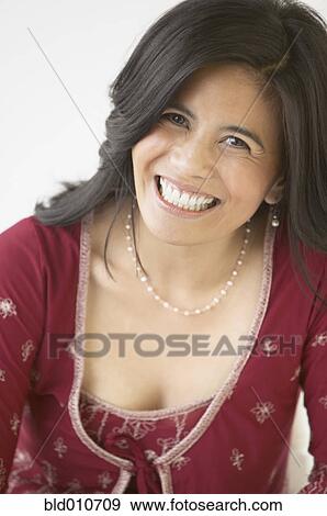 Asian woman smiling View Large Photo Image Stock Photo - Asian woman smiling. Fotosearch