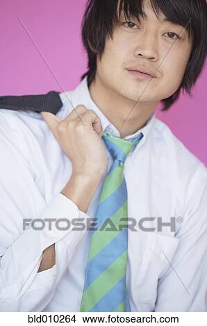 Picture - Businessman with his jacket off. Fotosearch