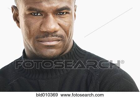 Stock Photo - Close up of a serious man. Fotosearch