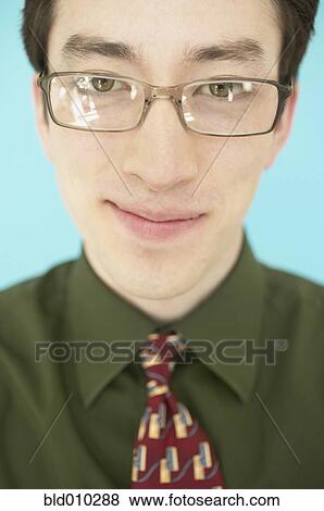 Close up of a smiling businessman View Large Photo Image Stock Photo - Close up of a smiling businessman. Fotosearch