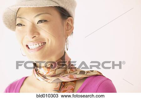 Close up of a young woman smiling View Large Photo Image Stock Image - Close up of a young woman smiling. Fotosearch