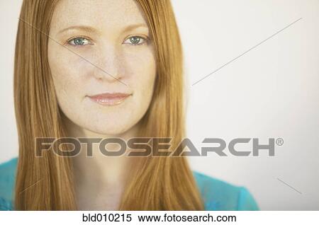 Close up of a young woman smiling View Large Photo Image Stock Photography - Close up of a young woman smiling. Fotosearch