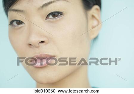 Close up of a young woman's face View Large Photo Image Stock Image - Close up of a young woman's face. Fotosearch