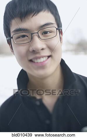 Close up of teenage boy smiling View Large Photo Image Stock Photo - Close up of teenage boy smiling. Fotosearch