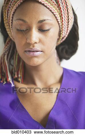 Close up of woman wearing headscarf View Large Photo Image Stock Image - Close up of woman wearing headscarf. Fotosearch