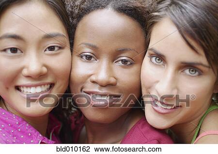 Close up portrait of three female friends View Large Photo Image Stock Image - Close up portrait of three female friends. Fotosearch