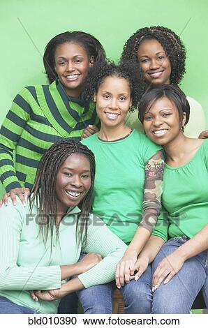Stock Image - Group of female friends together. Fotosearch